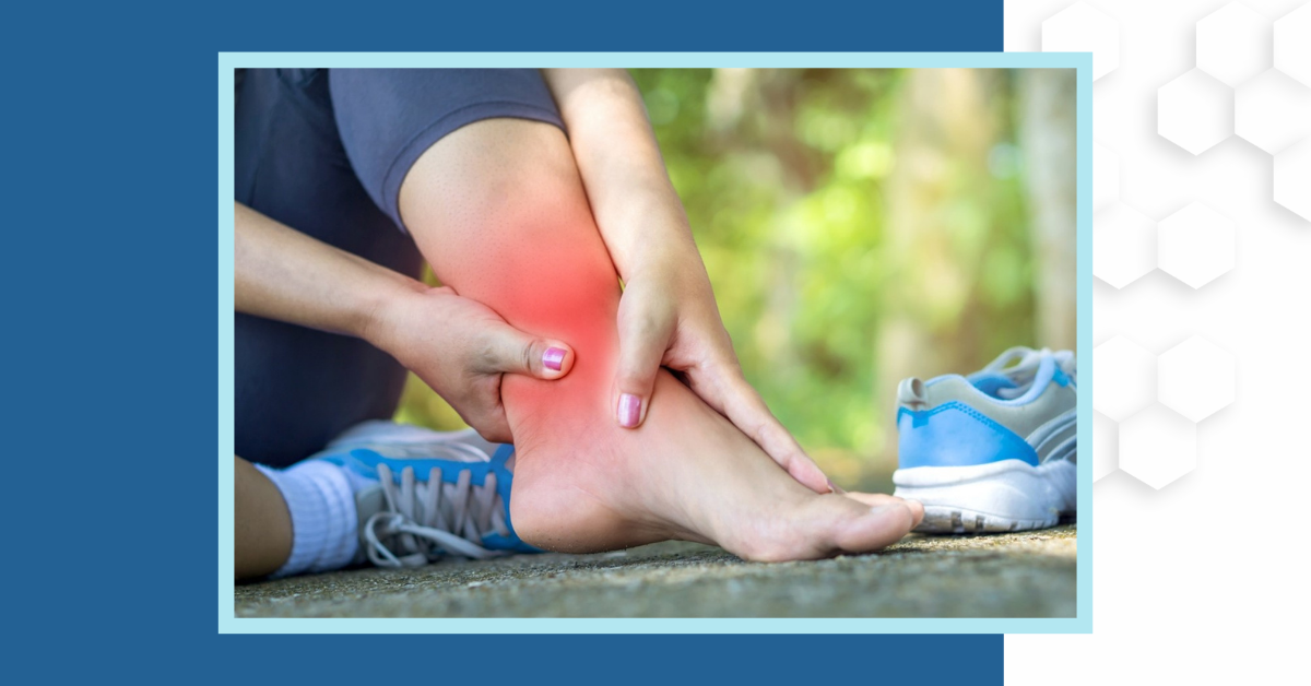 Woman holds her sprained ankle