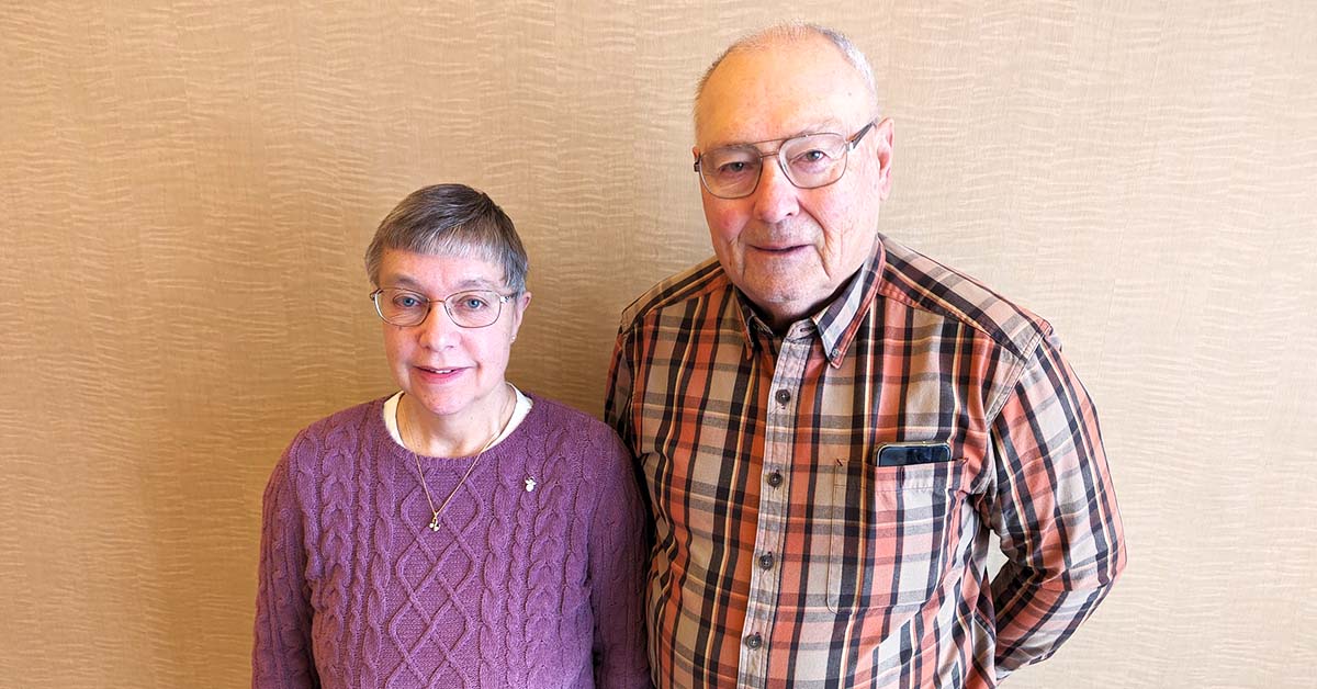 Oral surgery patient Barb Weisnicht poses for a photo with her husband, Jerry.