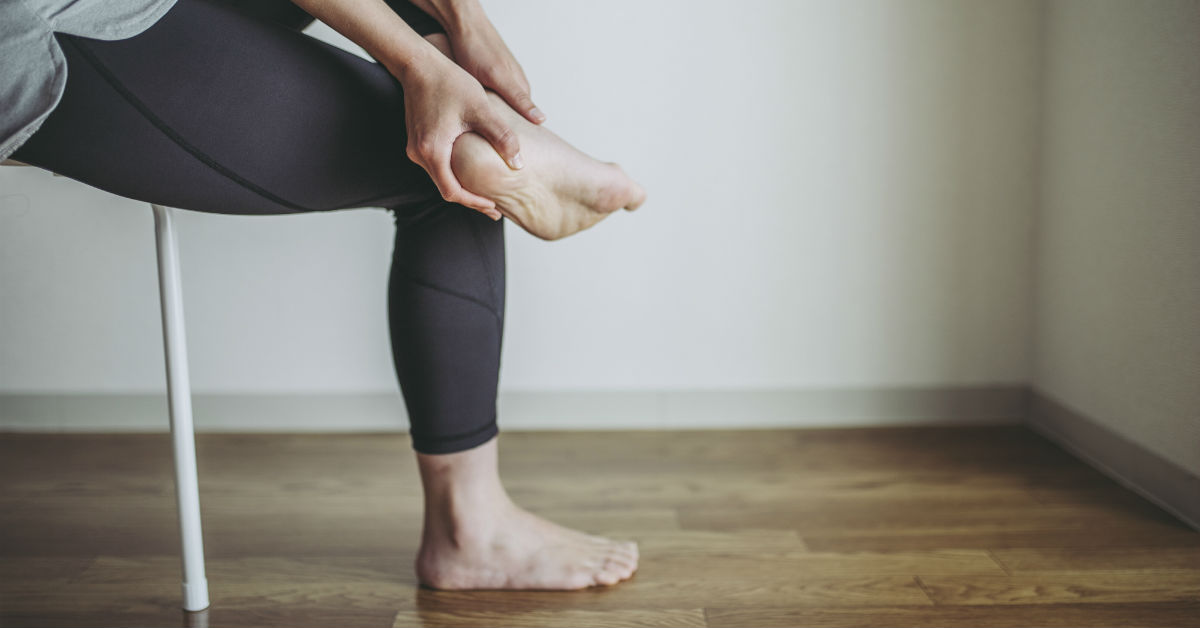 Person massaging foot